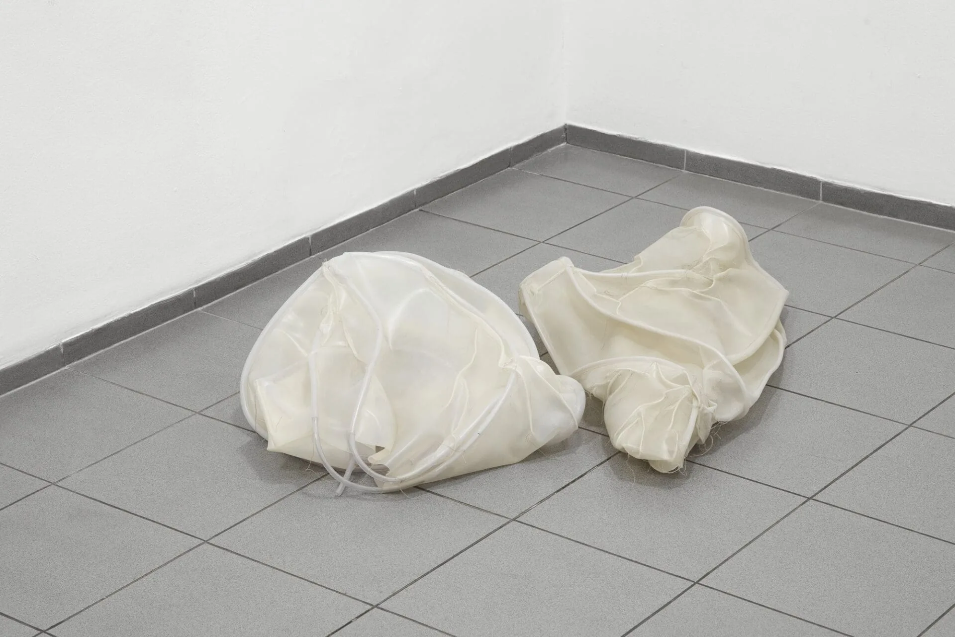 Cocoons (Rocks) 2018-2019, silicone, pipes, thread