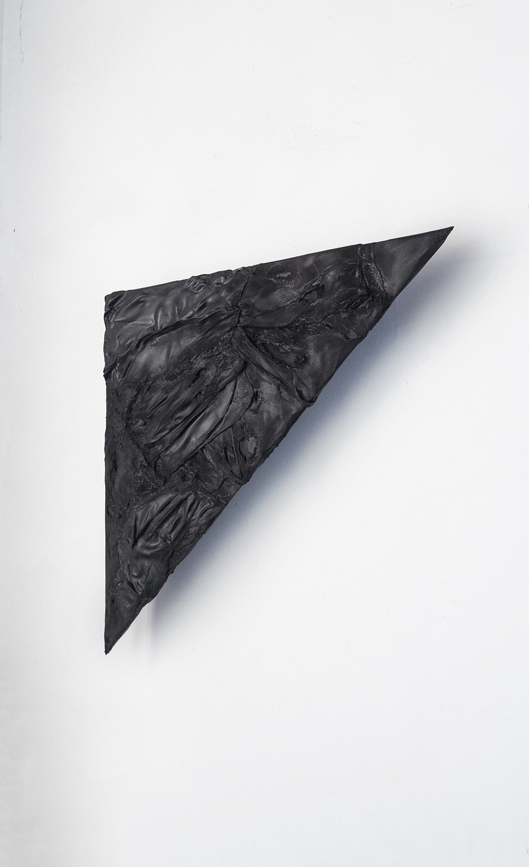 Black Triangle#1, 2021 | PVC tarp on plywood, subwoofer, amplifier. 70 × 70 × 100 cm