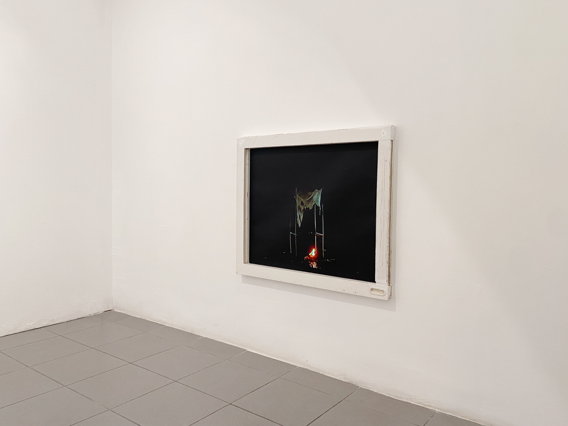 Efrat Natan, Phoenix, 2007, video and window frame, 18:42 min (loop), 65x78x3 cm