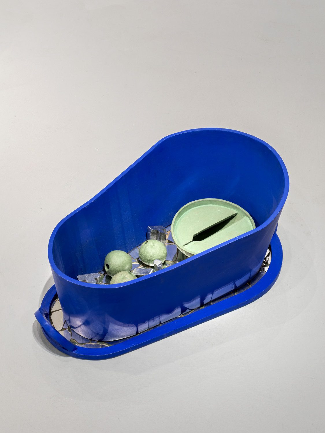 Blue Basin, 1991, wood, concrete, and aluminium casts, 35 x 80 x 30 cm